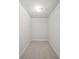 Walk-in closet with neutral carpeting and overhead light at 1252 Grist Mill Dr, Acworth, GA 30101