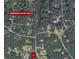 Aerial view of the home's location within the neighborhood, showcasing its proximity to a neighborhood lake at 1252 Grist Mill Dr, Acworth, GA 30101