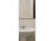 Pedestal sink with chrome faucet and simple mirror offers a clean and functional bathroom design at 516 Almere Dr, Hampton, GA 30228