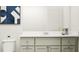 Bathroom vanity featuring shaker cabinets, white countertop, and modern fixtures for a clean, elegant space at 516 Almere Dr, Hampton, GA 30228