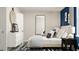 Bright bedroom with a minimalist dresser, stylish mirrors, and plush bedding for a cozy retreat at 516 Almere Dr, Hampton, GA 30228