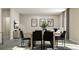 Contemporary dining room with stylish table and chairs set, and modern decor at 516 Almere Dr, Hampton, GA 30228