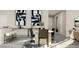Inviting dining area featuring modern art and bar stool seating, perfect for entertaining at 516 Almere Dr, Hampton, GA 30228