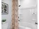 Cozy bathroom with a patterned shower curtain and modern fixtures at 619 Catesby Ter, Dacula, GA 30019