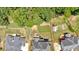 Aerial view of a property, highlighting its fenced backyard and surroundings at 6236 Millstone Trl, Douglasville, GA 30135