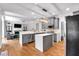 Well-designed kitchen featuring an island, stainless steel appliances and an open floorplan at 6236 Millstone Trl, Douglasville, GA 30135