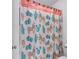 Close up of shower curtain featuring a cactus and llama pattern at 6236 Millstone Trl, Douglasville, GA 30135
