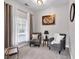 Cozy sitting room with comfortable armchairs and soft natural light at 6236 Millstone Trl, Douglasville, GA 30135