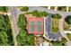 Aerial view showcasing the community tennis courts, parking, and swimming pool at 6236 Millstone Trl, Douglasville, GA 30135