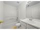 Clean bathroom featuring a shower and bath combination with a single sink at 1030 Carriage Trace Cir, Stone Mountain, GA 30087