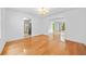 Dining room features hardwood floors and ample light with an open concept at 1030 Carriage Trace Cir, Stone Mountain, GA 30087