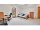Bedroom featuring a daybed, desk, and window offering natural light and views at 2071 Habersham Cir, Covington, GA 30014