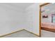 Walk-in closet with shelving leads to primary bedroom at 2071 Habersham Cir, Covington, GA 30014
