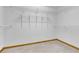 Walk-in closet with carpeted floor and shelving, ready for storage at 2071 Habersham Cir, Covington, GA 30014