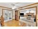 Bright living room featuring glass French doors, crown molding, and an elegant fireplace at 2071 Habersham Cir, Covington, GA 30014
