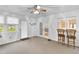 Sunroom offers natural light and access to the outdoors, with a neutral decor at 2071 Habersham Cir, Covington, GA 30014