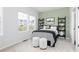 Cozy bedroom with soft carpet, ample natural light, and stylish decor at 2682 Brookview Nw Ln, Atlanta, GA 30318