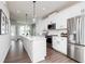 Modern kitchen features white cabinets, stainless steel appliances, and a center island at 2682 Brookview Nw Ln, Atlanta, GA 30318