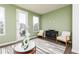 Bright living room with a walkout to deck, stylish furniture, and decor at 2682 Brookview Nw Ln, Atlanta, GA 30318