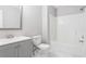 A tidy bathroom with a shower-tub, modern vanity, and a toilet at 5484 Denny Dr, Atlanta, GA 30349