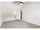 Spacious bedroom with plush carpeting and ample natural light provides a tranquil retreat at 5484 Denny Dr, Atlanta, GA 30349