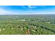 An aerial view of a cozy home surrounded by lush greenery, offering a peaceful retreat at 69 Southern Trace Way, Rockmart, GA 30153