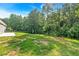 Large, lush backyard with mature trees, perfect for outdoor activities and relaxation at 69 Southern Trace Way, Rockmart, GA 30153