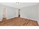 Spacious bedroom with hardwood floors, a closet and an attached bathroom at 69 Southern Trace Way, Rockmart, GA 30153