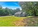 Charming single-story home with a welcoming porch and spacious front yard under a clear blue sky at 69 Southern Trace Way, Rockmart, GA 30153
