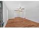 Bright living room featuring wood floors, ceiling fan, and neutral paint at 69 Southern Trace Way, Rockmart, GA 30153