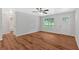 Spacious living room with wood flooring, neutral walls, and bright natural light at 69 Southern Trace Way, Rockmart, GA 30153