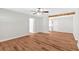 Open concept living room with modern wood flooring and natural wood beam at 69 Southern Trace Way, Rockmart, GA 30153