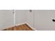 Mudroom features beautiful wood-look flooring and a clean, minimalist design with white walls and trim at 69 Southern Trace Way, Rockmart, GA 30153