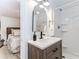 Modern bathroom with updated vanity and a walk-in shower at 706 Powder Springs Se St, Smyrna, GA 30080