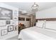 Light-filled bedroom featuring neutral tones, comfortable bedding, and a connected office space at 706 Powder Springs Se St, Smyrna, GA 30080