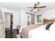 Stylish bedroom boasting hardwood floors, natural light, and ensuite bathroom access at 706 Powder Springs Se St, Smyrna, GA 30080