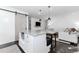 Stylish kitchen featuring a kitchen island and seamless living area with modern features at 706 Powder Springs Se St, Smyrna, GA 30080