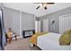 Well-lit bedroom with neutral tones, comfortable carpet, and spacious layout at 14 Black Forest Run, Douglasville, GA 30134