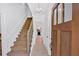 Inviting foyer with hardwood floors and staircase, leading to the upper level at 14 Black Forest Run, Douglasville, GA 30134