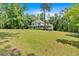 Large, charming two-story home with a welcoming front porch and well-maintained lawn at 14 Black Forest Run, Douglasville, GA 30134