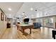 Large basement area with a fireplace, TV, and built-in shelving at 522 Golfview Dr, Peachtree City, GA 30269