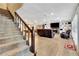 Finished basement with stairs, Gathering room, fireplace, and pool table at 522 Golfview Dr, Peachtree City, GA 30269