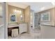 Beautiful bathroom featuring a vanity and makeup counter with wood look tile floor at 522 Golfview Dr, Peachtree City, GA 30269
