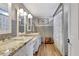 Bathroom with double sinks, wood flooring, and shower at 522 Golfview Dr, Peachtree City, GA 30269