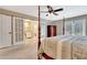 Bedroom with a four-poster bed, french doors, and en suite bathroom at 522 Golfview Dr, Peachtree City, GA 30269