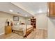 Bedroom with light colored walls, carpet, bed, and dresser at 522 Golfview Dr, Peachtree City, GA 30269