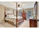 Bedroom with traditional furnishings, windows, and natural light at 522 Golfview Dr, Peachtree City, GA 30269