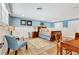 Basement bedroom with a large bed and comfortable chairs at 522 Golfview Dr, Peachtree City, GA 30269
