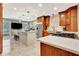 Bright, open kitchen featuring stainless appliances and a spacious center island at 522 Golfview Dr, Peachtree City, GA 30269