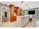 Kitchen featuring modern cabinets, a center island with seating, and view to hall at 522 Golfview Dr, Peachtree City, GA 30269